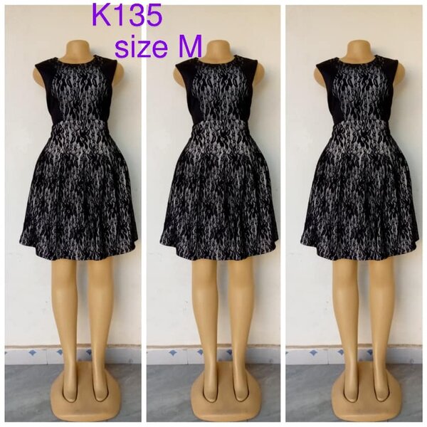 Black dress with white lining, size M