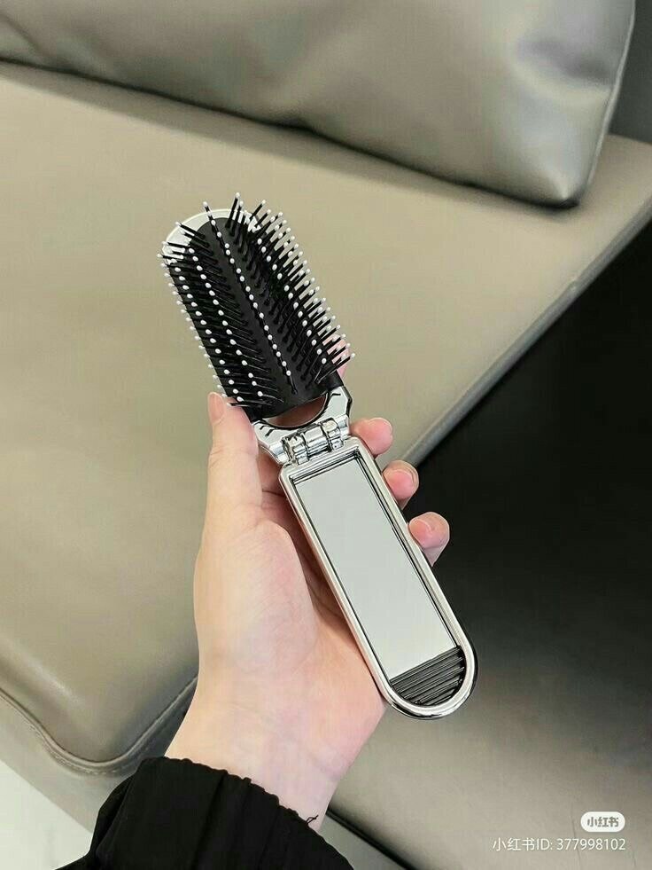 Brosse à cheveux pliante avec miroir