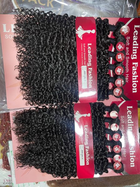 Extensions Bouclés Noirs 16-20 pouces