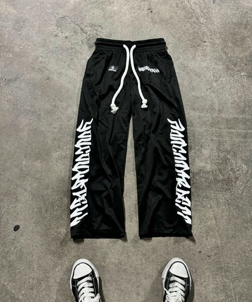 Pantalon noir à cordon style streetwear