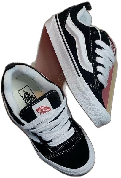 Chaussures de skate noires Vans