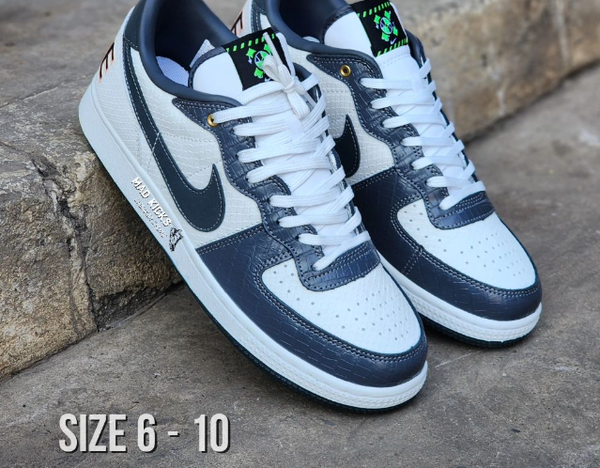 Dark grey white Nike sneakers