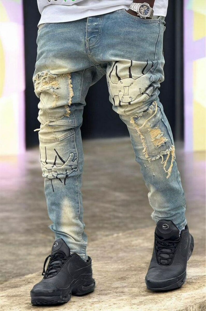 Jeans déchirés homme