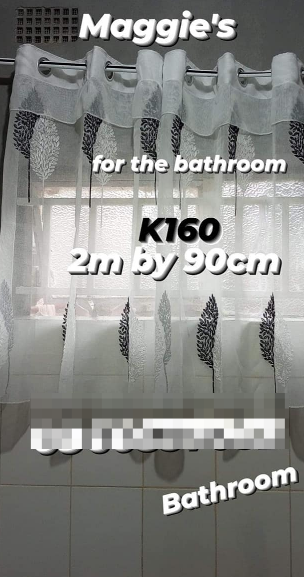 white bath curtains with leaves