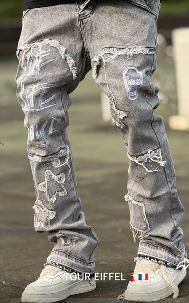 Jeans déchirés modernes homme