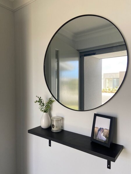 Mirror with rack