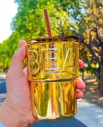 Beautiful UV Gold Plated High Quality Glass Tumbler with Splash-Proof Lid and Reusable Straw
