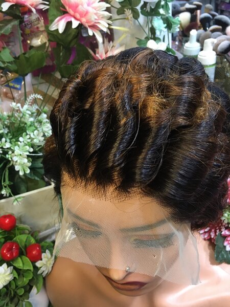 Afro B pixie cutting