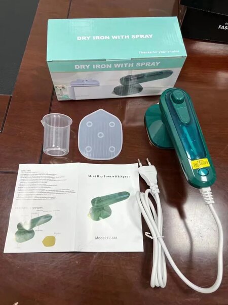 Fer à repasser portable vapeur