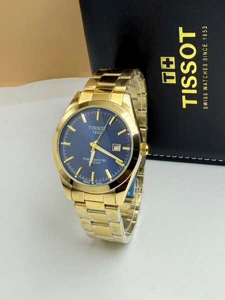 Montre automatique dorée homme Tissot