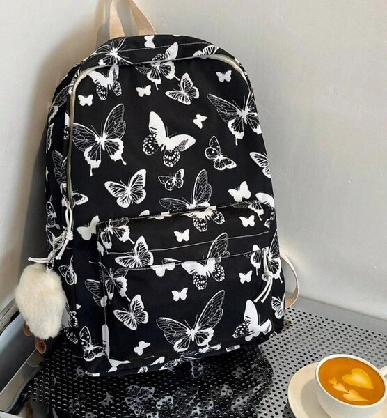 Sac à dos papillons noir élégant