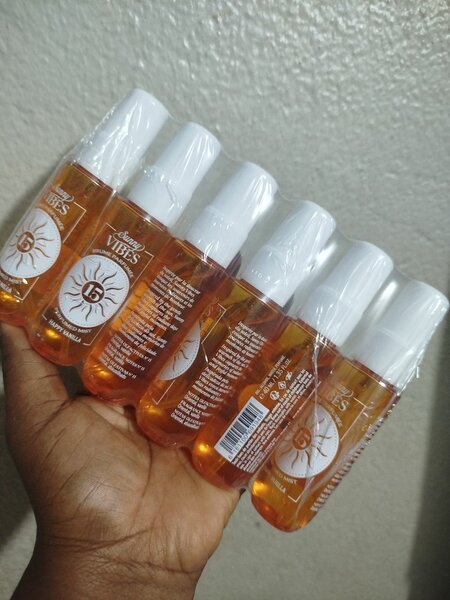 Spray solaire SPF 15 compact