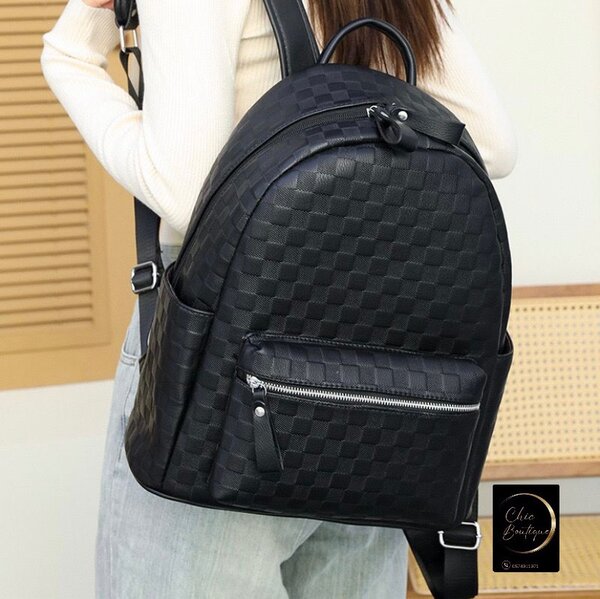 Sac à dos en cuir tressé