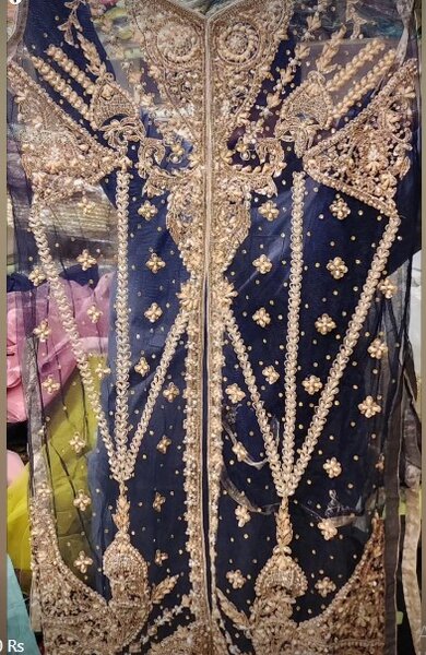 Beautiful and stylish women's outfit decorated with embroidery