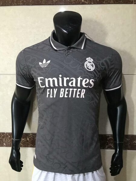 Real Madrid men's soccer uniform in grey, with Adidas and Emirates Fly Better logos