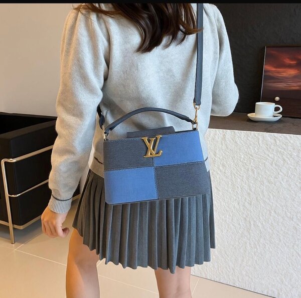 Sac à main élégant bicolore