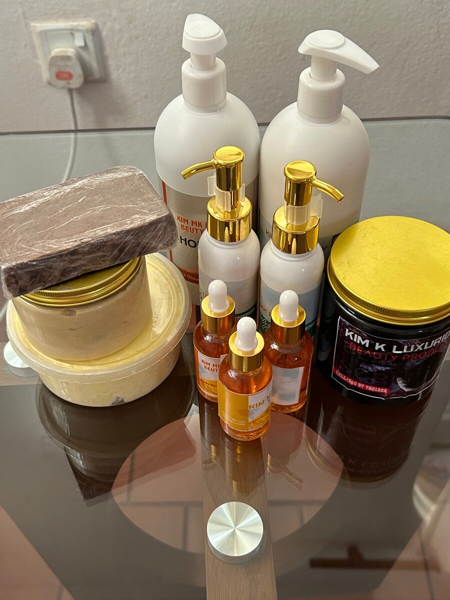 Body lightening cream and black charcoal scrub