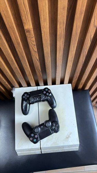 Used PS4 standard  With Two Games installed ¢1800