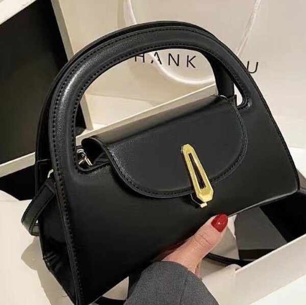 Beautiful fashionable women's handbag color black
