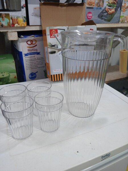 Plastic juice jar with 4 cups