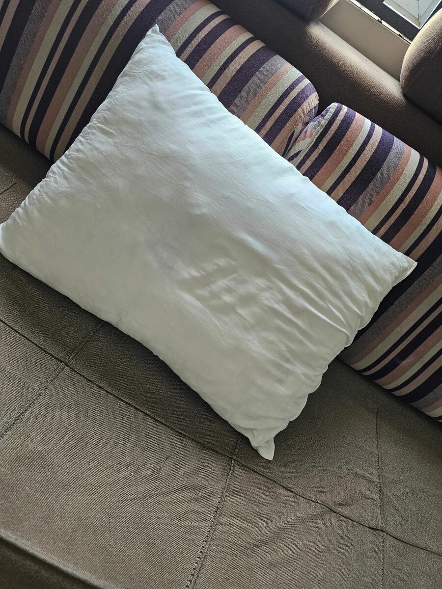 Pillow stuffed with cotton for comfortable sleep