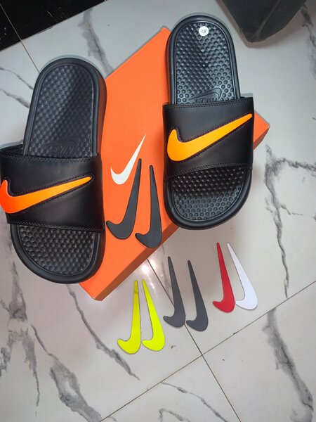 Nike slides with Nike stickers