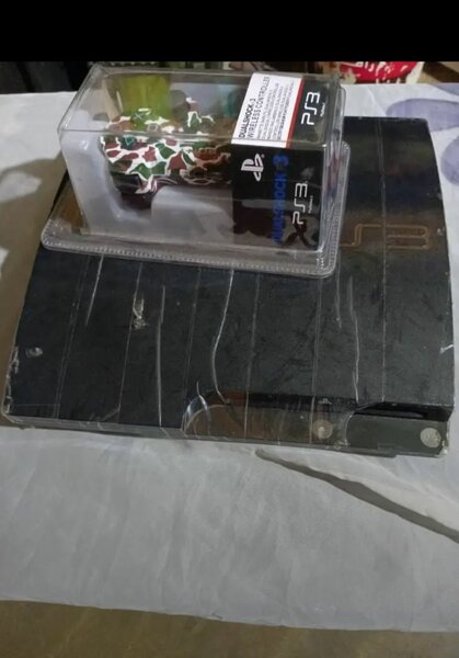 Console PS3 avec manette