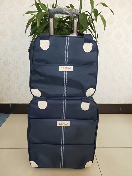 Valise à roulettes extensible