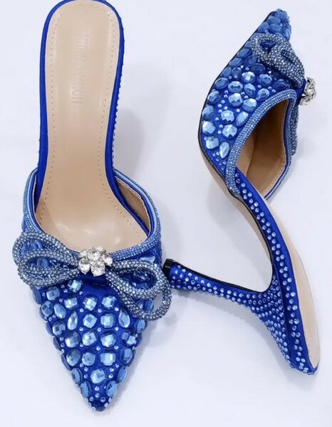 Blue sandals with large rhinestones