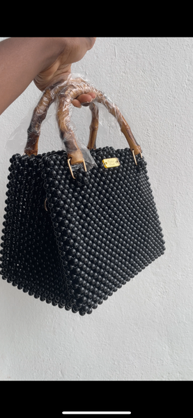Sac à main perles élégant