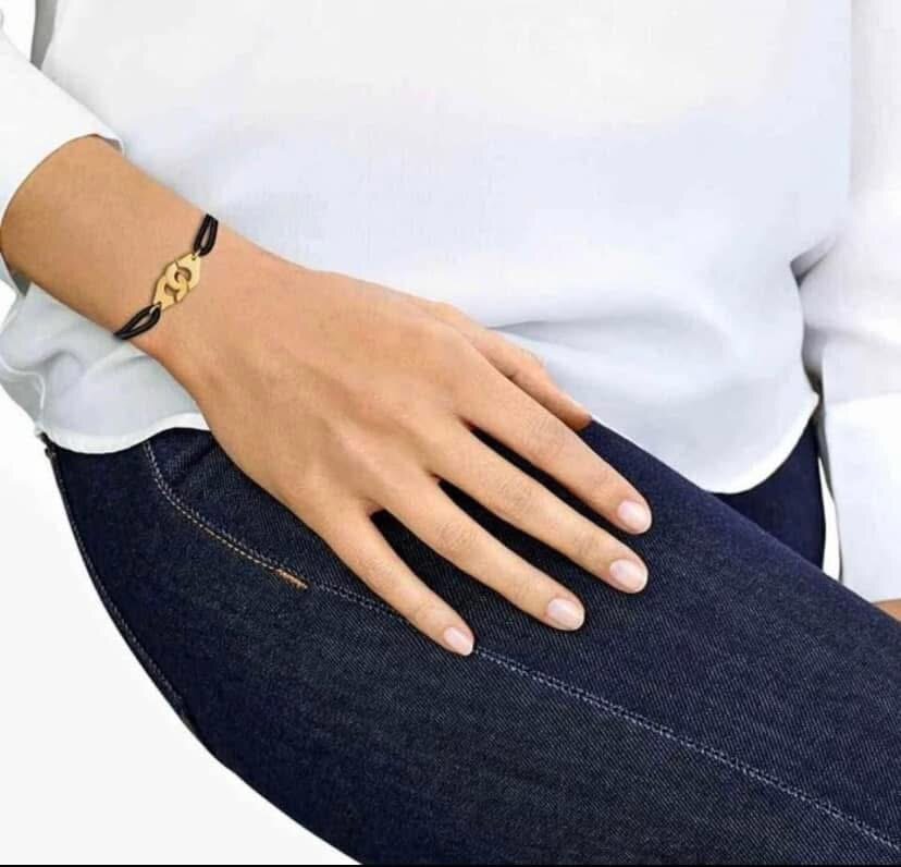 Bracelet corde rouge élégant