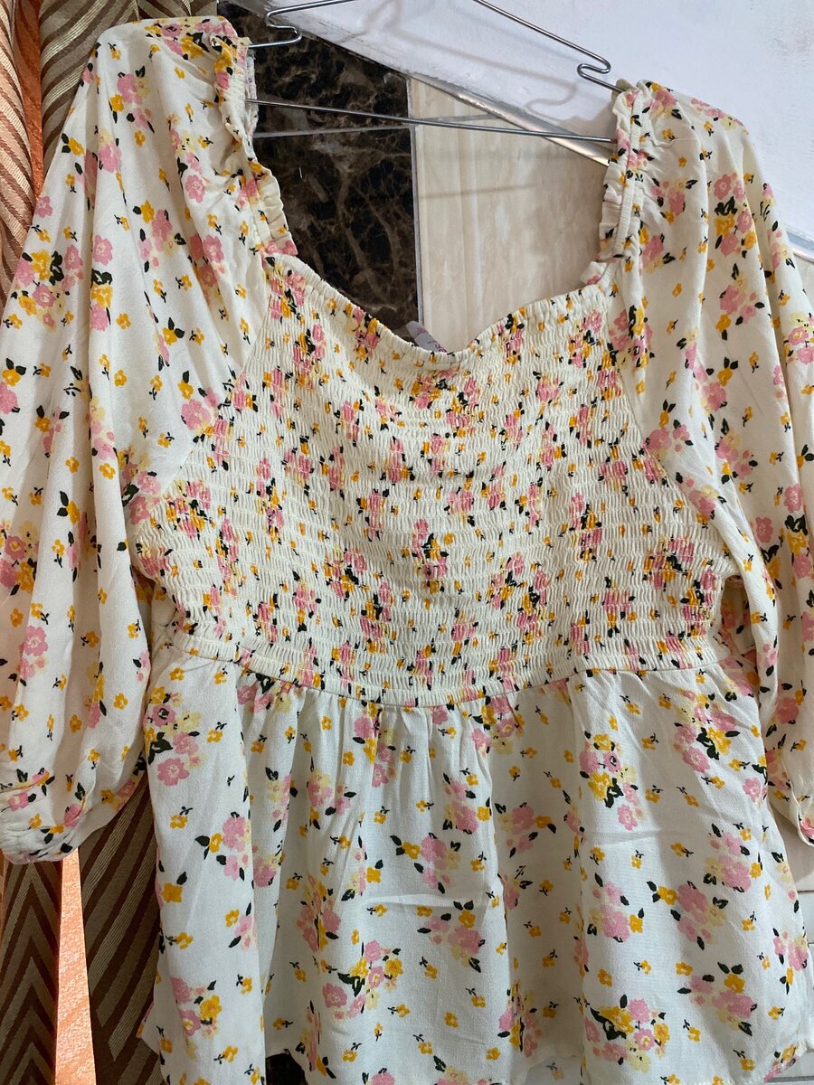 Floral ruched v neck blouse