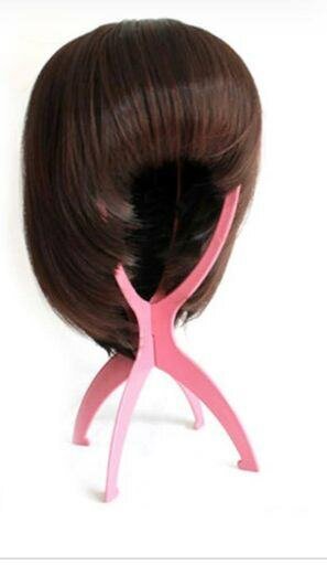 A Pair of Plastic Wig Stand