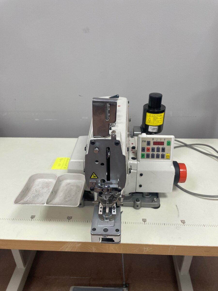 Пуговичная машина