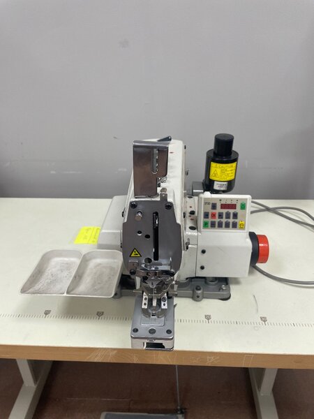 Пуговичная машина