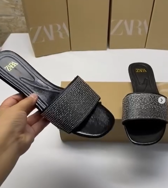 black sandals with stones