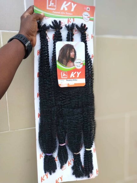 Extensions cheveux bouclés