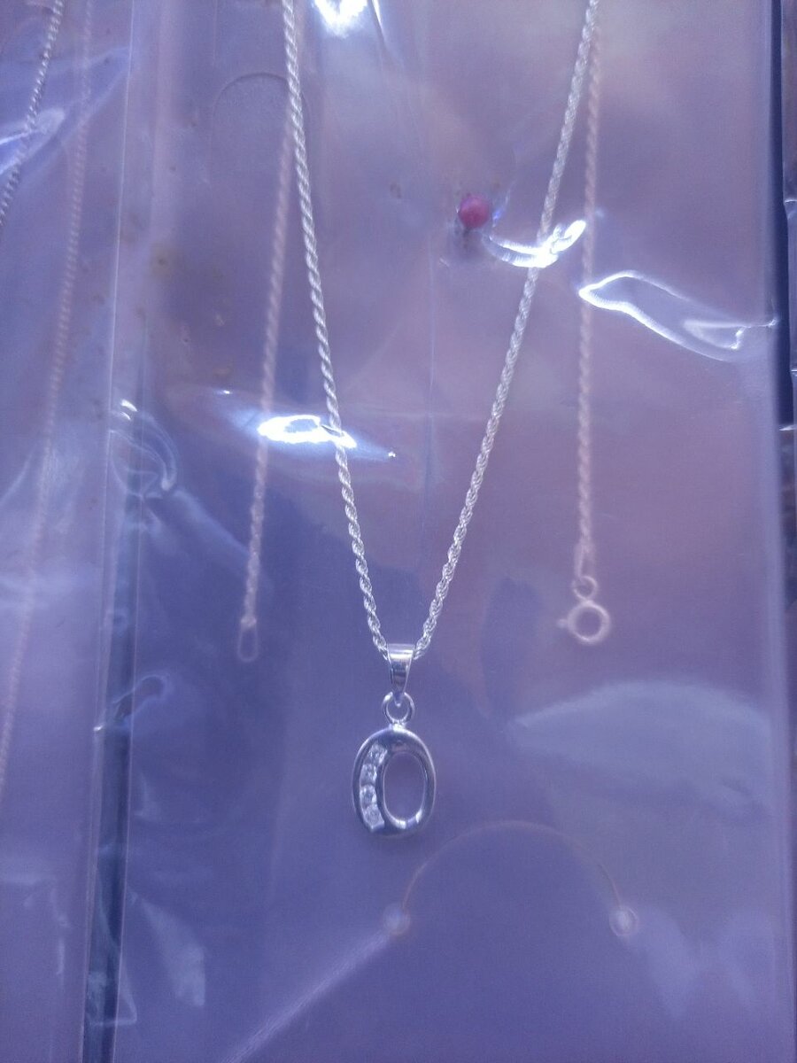 Silver necklace and locket