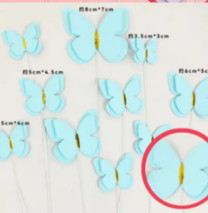 Paper butterflies for decorating cakes