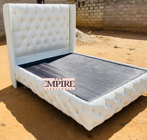 Bed with white upholstery