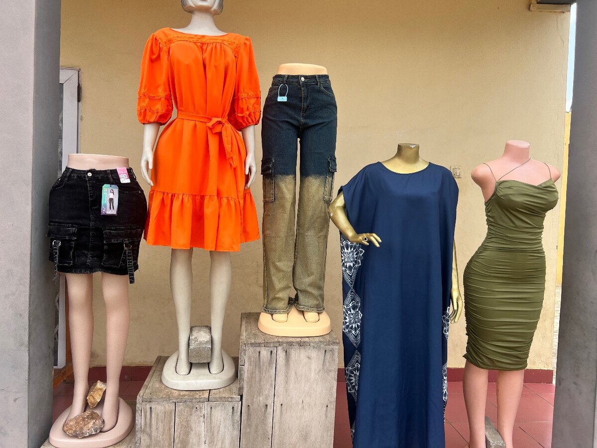 Dresses and jeans available in sizes.