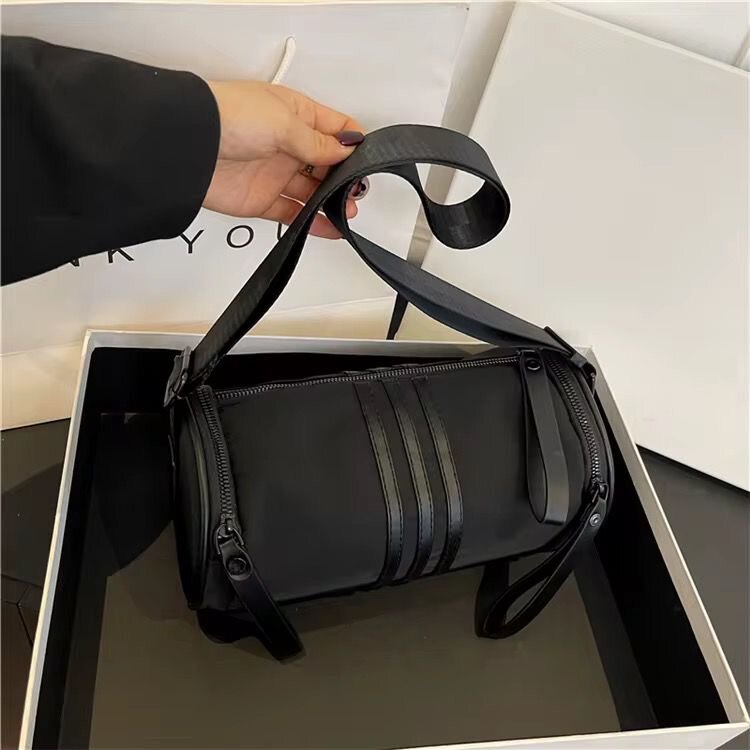 Sac bandoulière cylindrique élégant