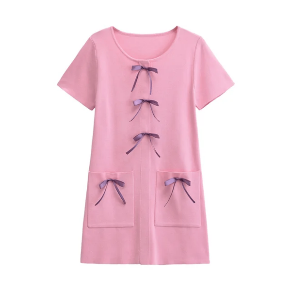 Robe rose avec nœuds violets