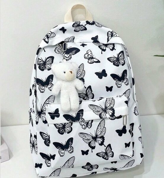 Sac à dos papillon avec peluche