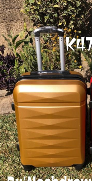 Travel medium bag in golden color