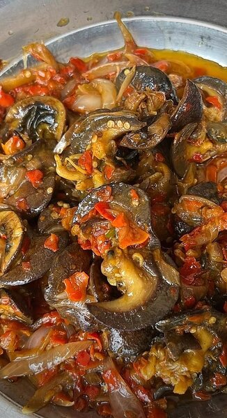 Escargots épicés en sauce