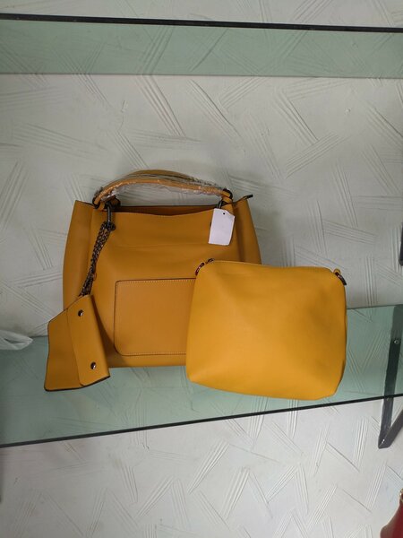 Les ensembles sacs pochette