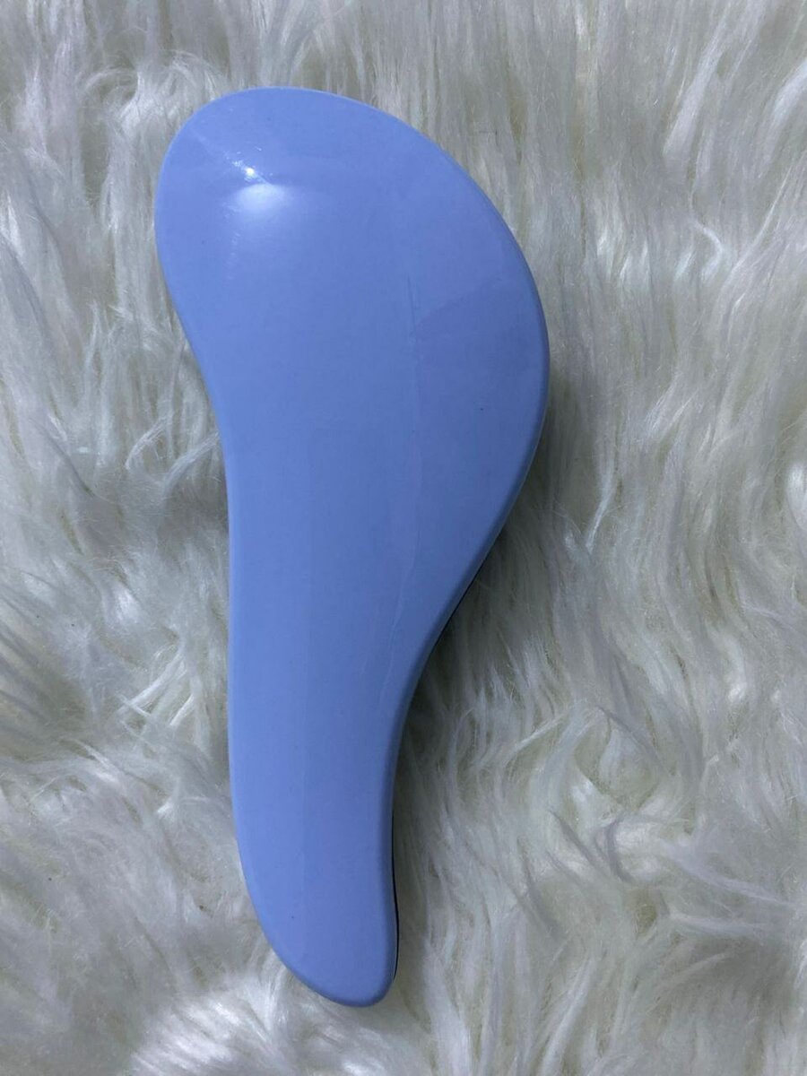 Brosse démêlante ergonomique