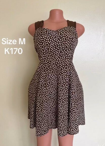 Brown flared dress with polka dots