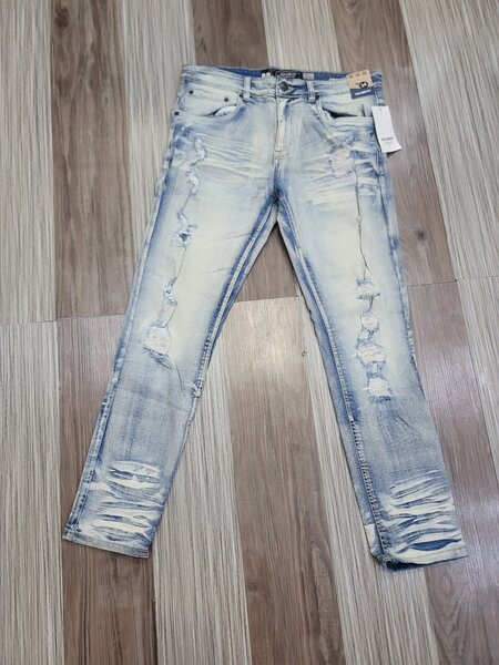Stylish jeans with blue shade ripped